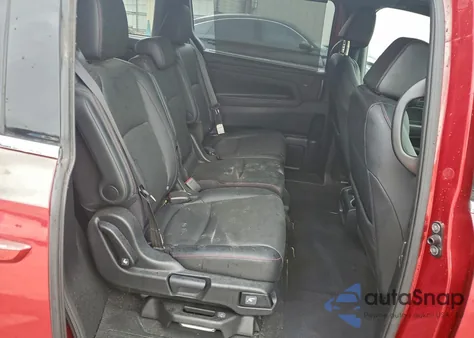 2023 Honda Odyssey Sport-L z USA, uszkodzony, nr VIN 5FNRL6H77PB043958